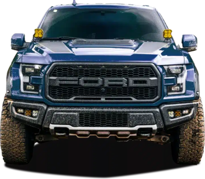 Front view of a blue Ford F-150 Raptor truck.